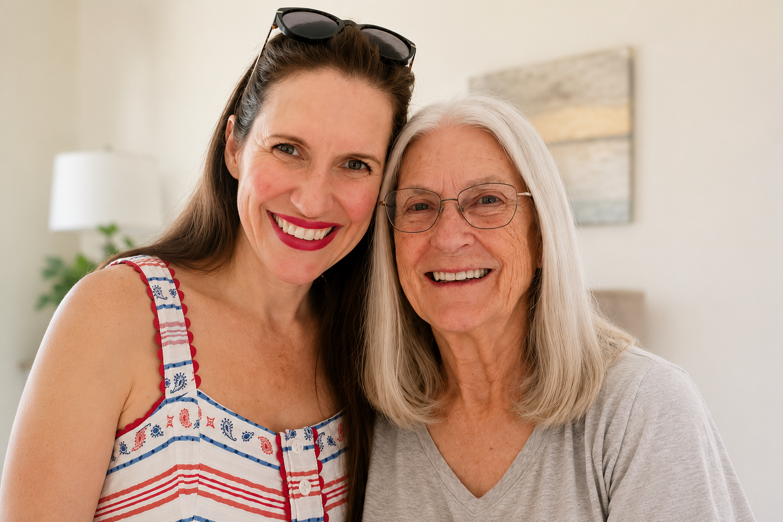 Katy and Dr. Judy smiling together, representing the Twin Mom Club team